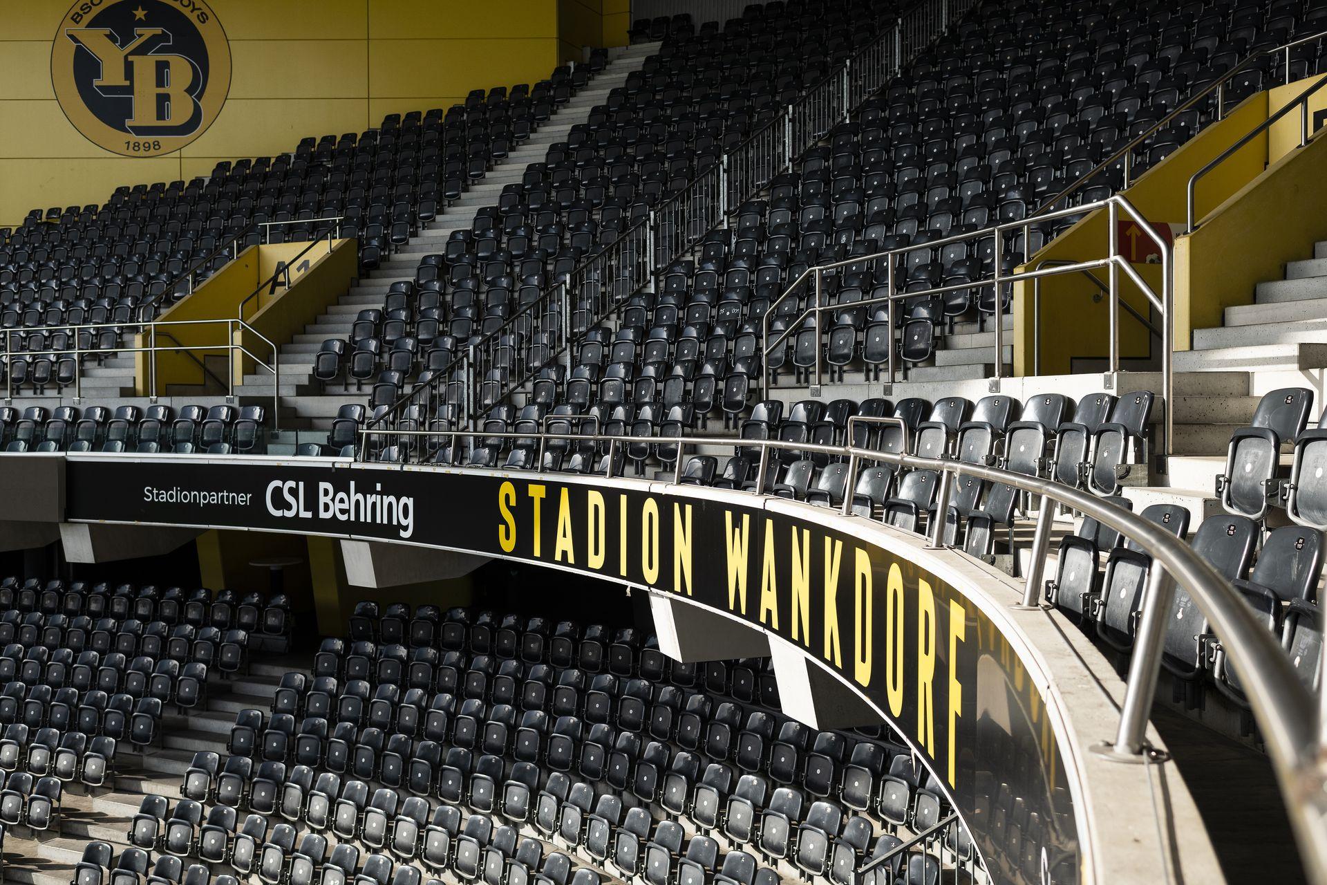 Stadion Wankdorf mit YB-Logo und Sitzreihen – Beschriftung von Lettra Design